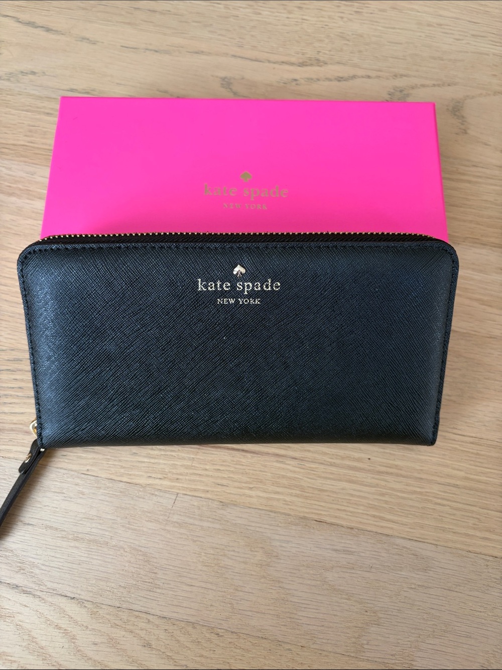 kate spade black zip-around continental wallet with gold logo